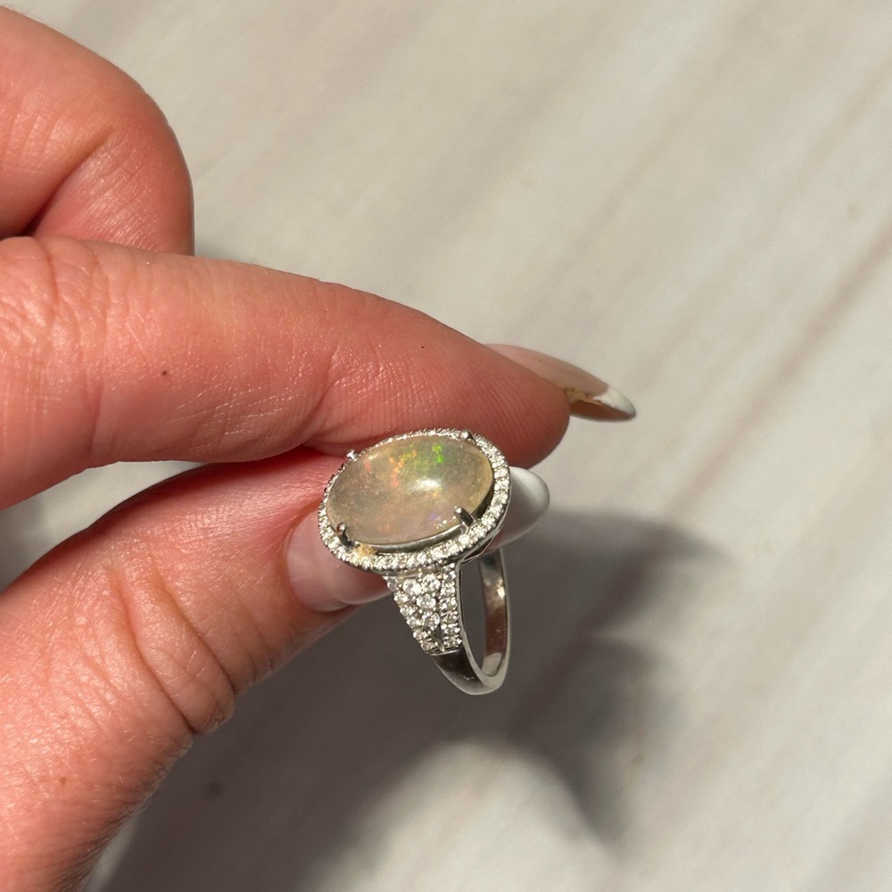White gold diamonds and opal ring